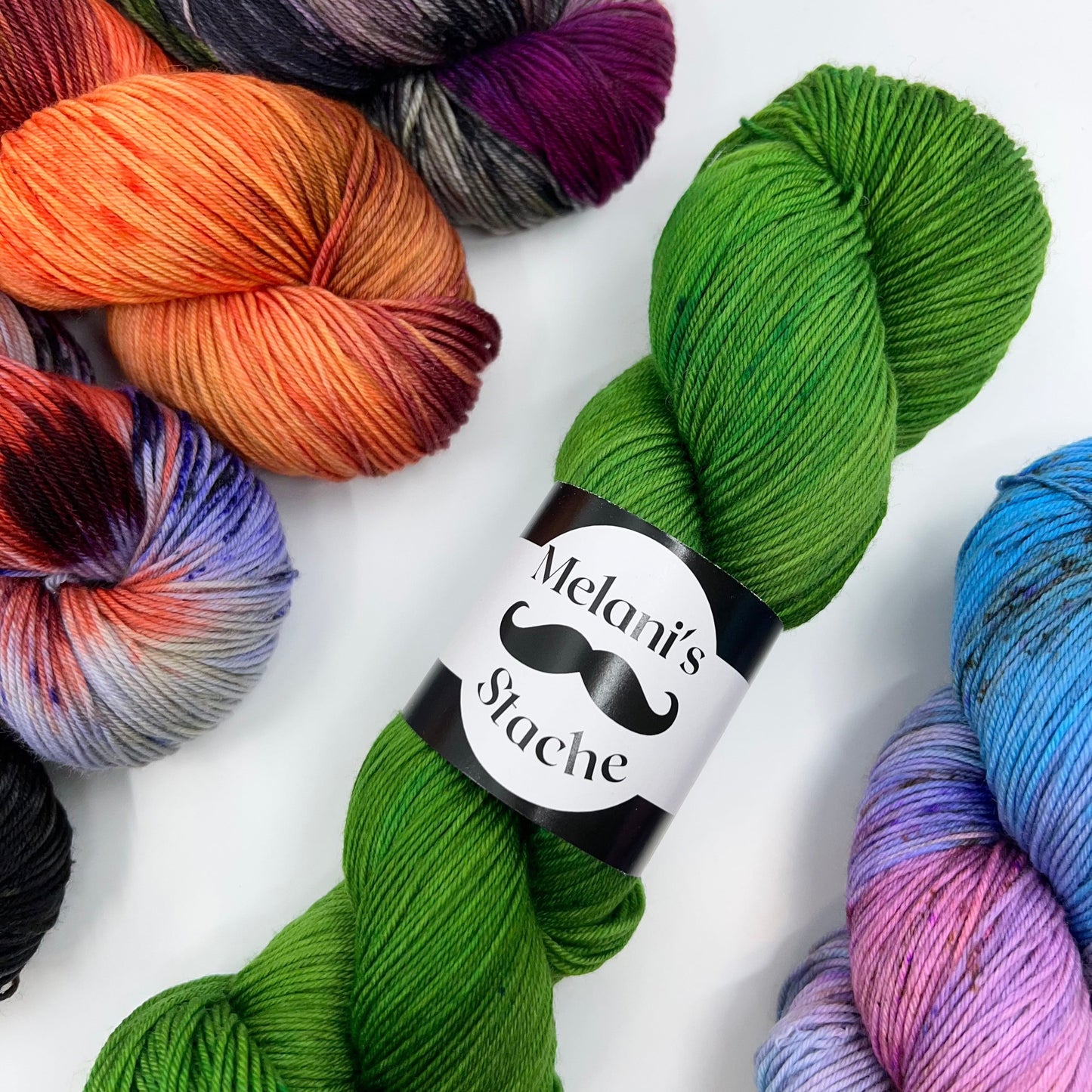 Melani's Stache-Tough Sock-yarn-gather here online