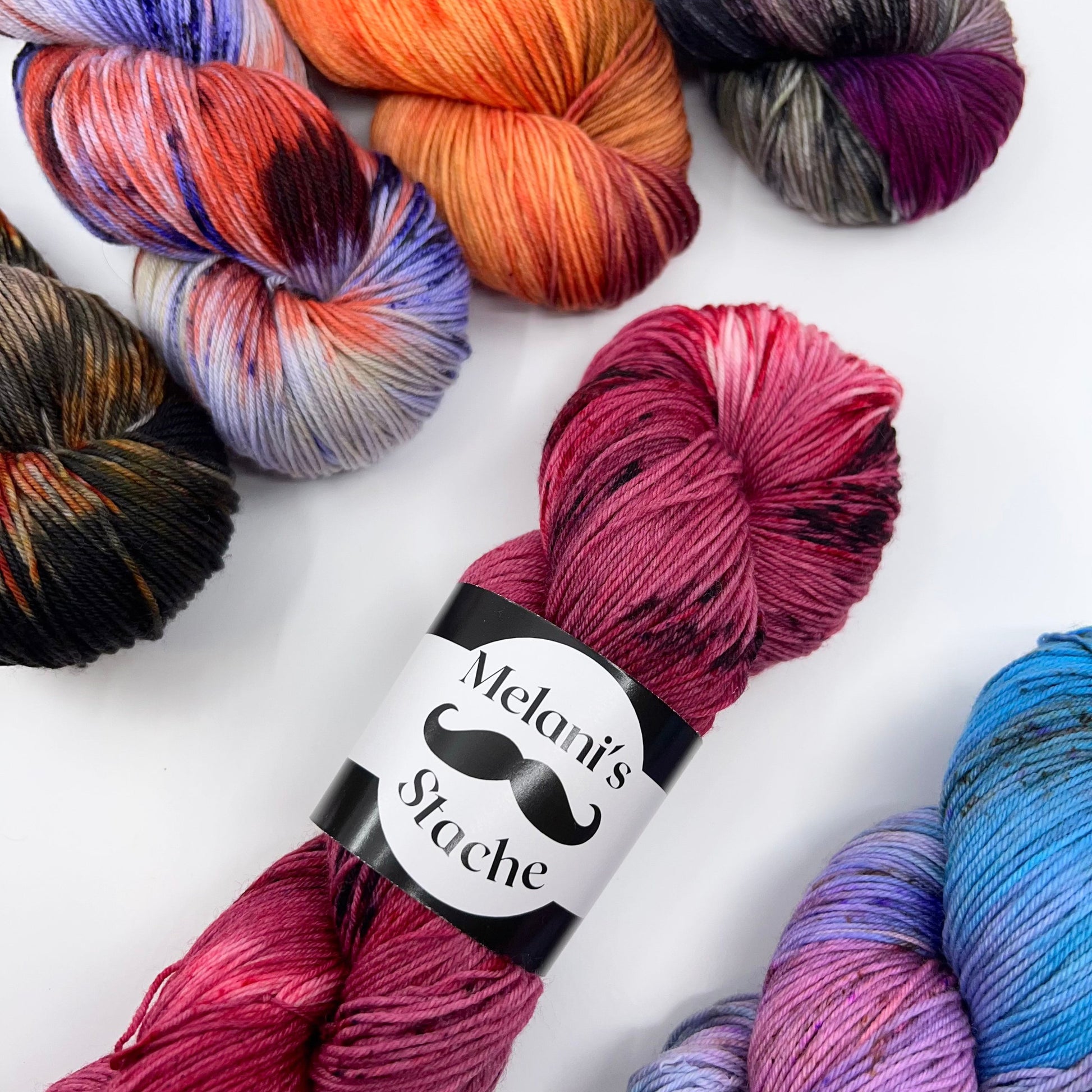 Melani's Stache-Tough Sock-yarn-gather here online