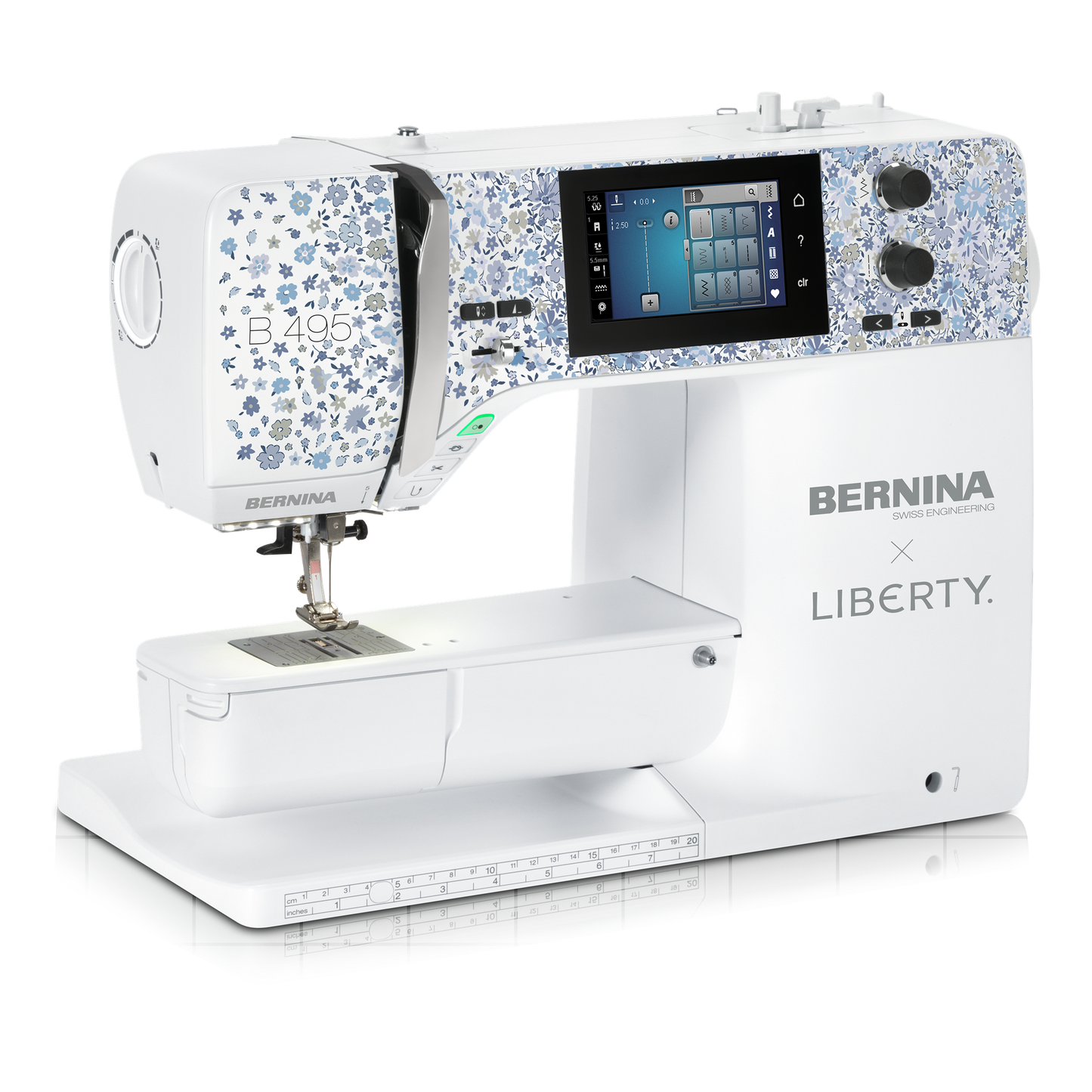 A BERNINA x LIBERTY B495 sewing machine in white with blue floral patterned accents on the upper housing, shown on a clean white background.