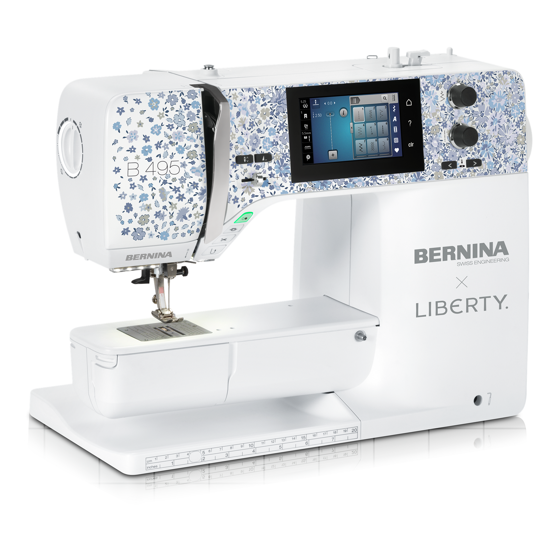 A BERNINA x LIBERTY B495 sewing machine in white with blue floral patterned accents on the upper housing, shown on a clean white background.