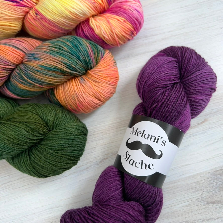 Melani's Stache-Tough Sock-yarn-gather here online