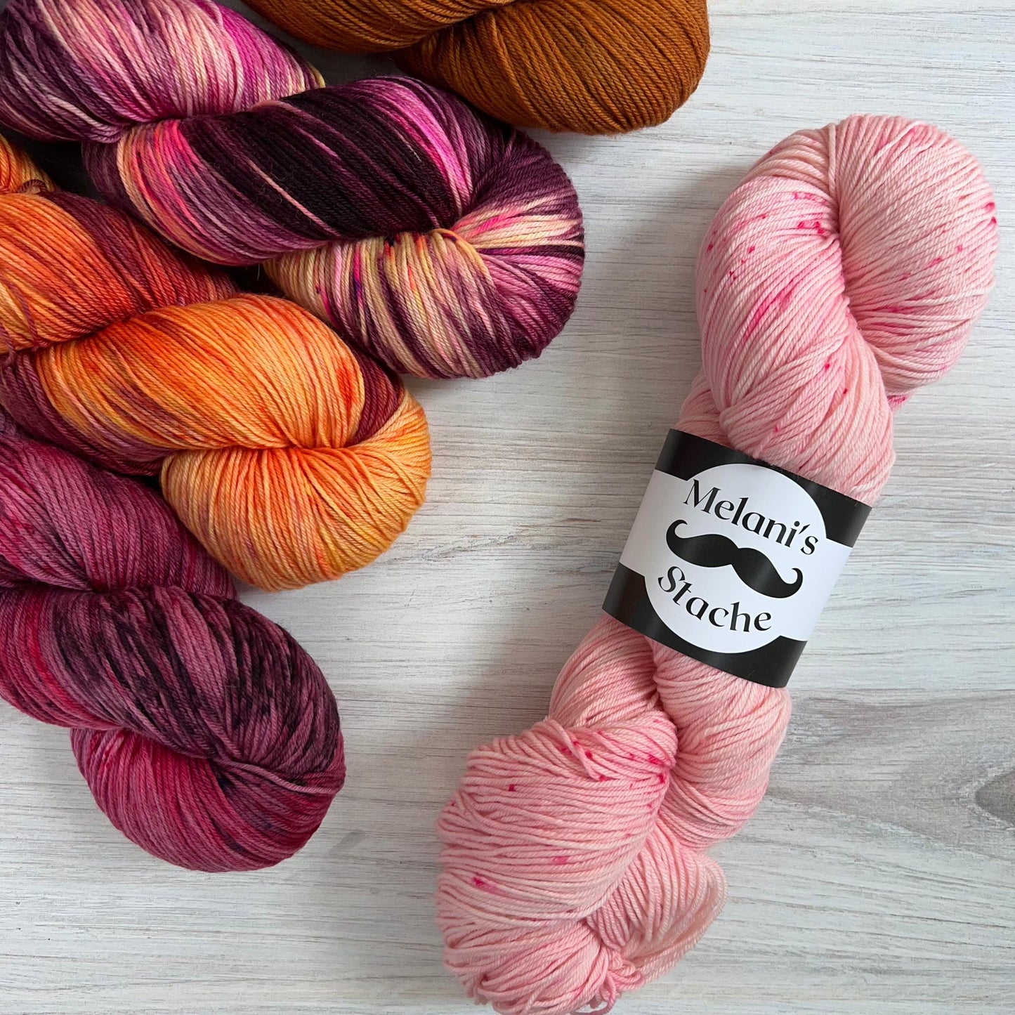 Melani's Stache-Tough Sock-yarn-gather here online